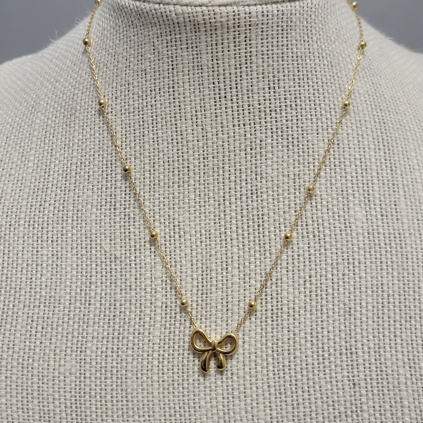 BOW SILVER NECKLACE